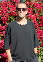 Black oversize t-shirt. Sleeves are a little lower an elbow